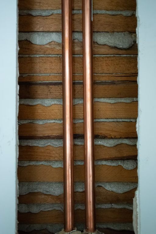 Copper supply lines installed in a wall