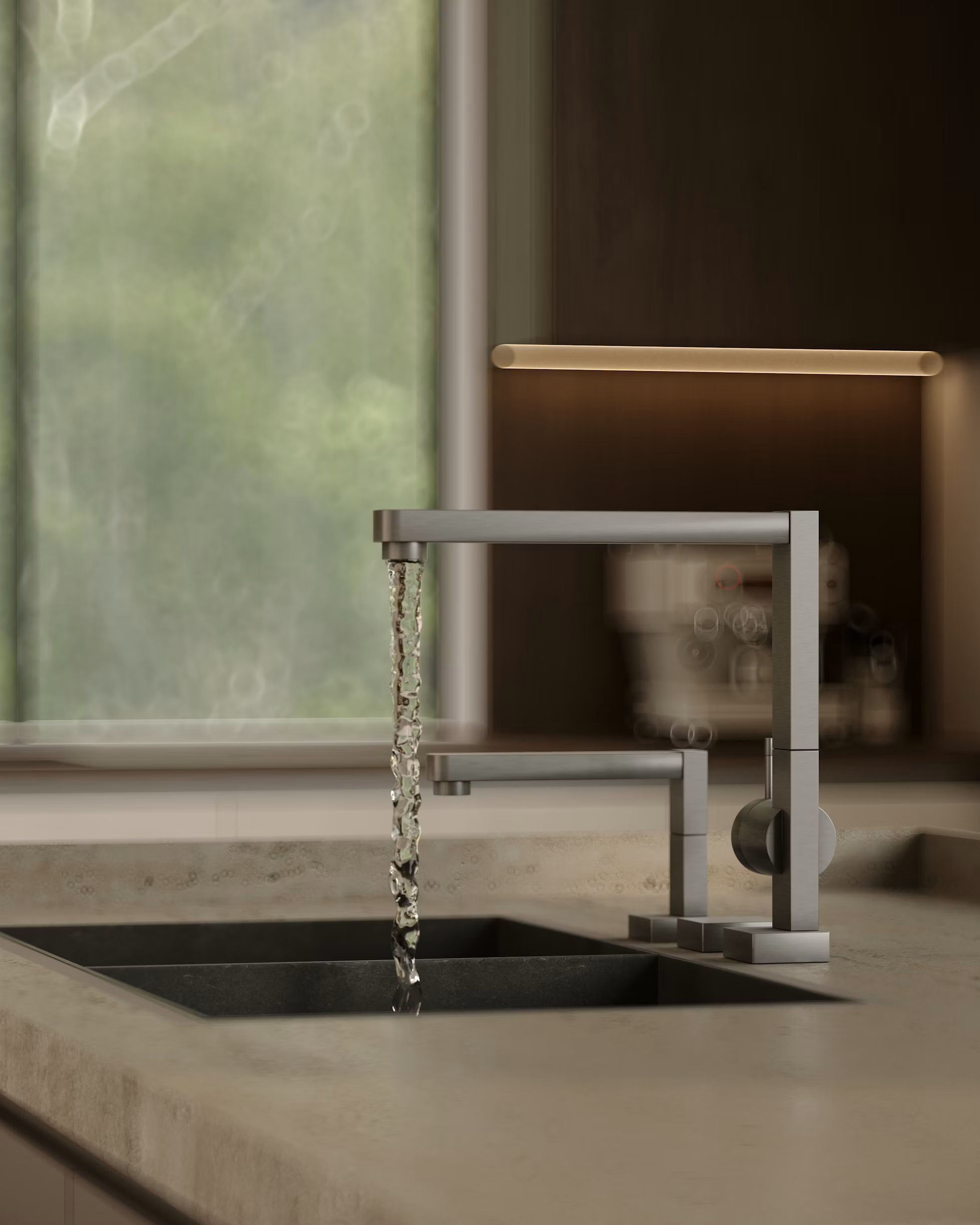 Modern kitchen faucet running over an undermount sink